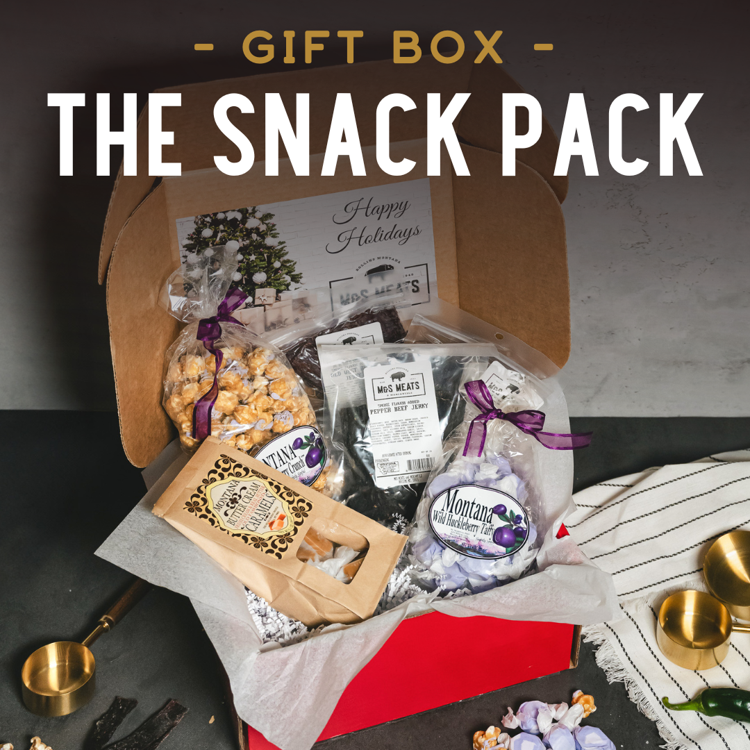 http://msmeats.com/cdn/shop/files/GiftBox-TheSnackPackholidayaffordablegiftboxfrommontana_1200x1200.png?v=1701089356